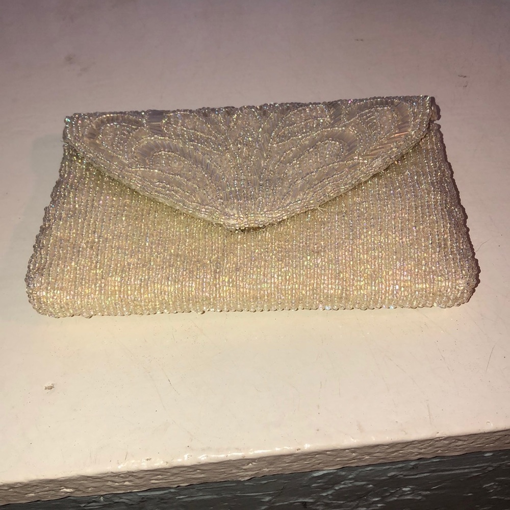 Cream beaded clutch